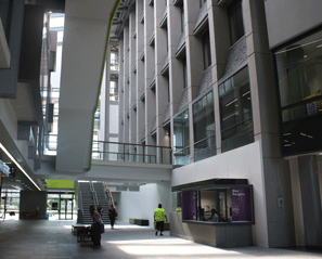 Atrium at the Grafton Campus showing the bridge<br /> on Level 1 into the Philson Library.